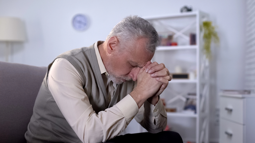 retired man praying