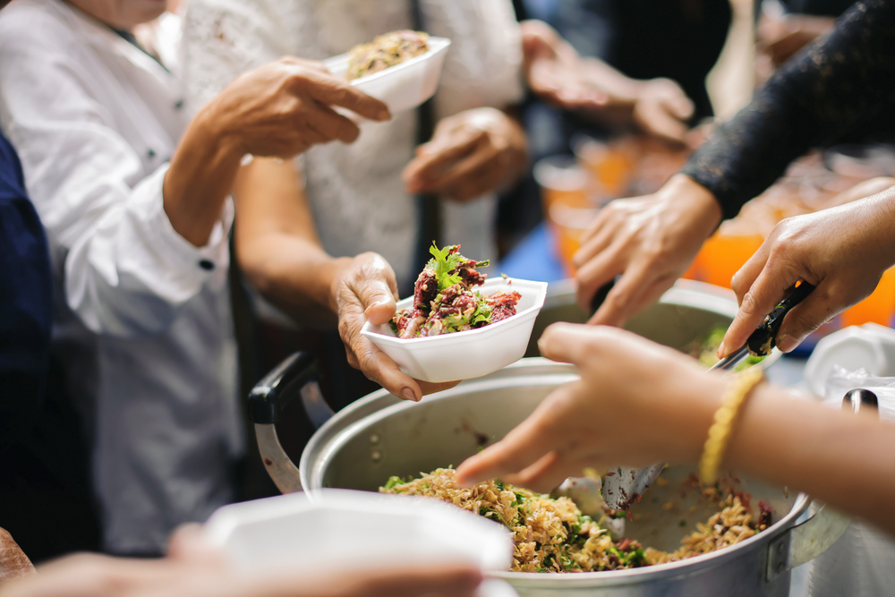 retirees volunteering at a soup kitchen