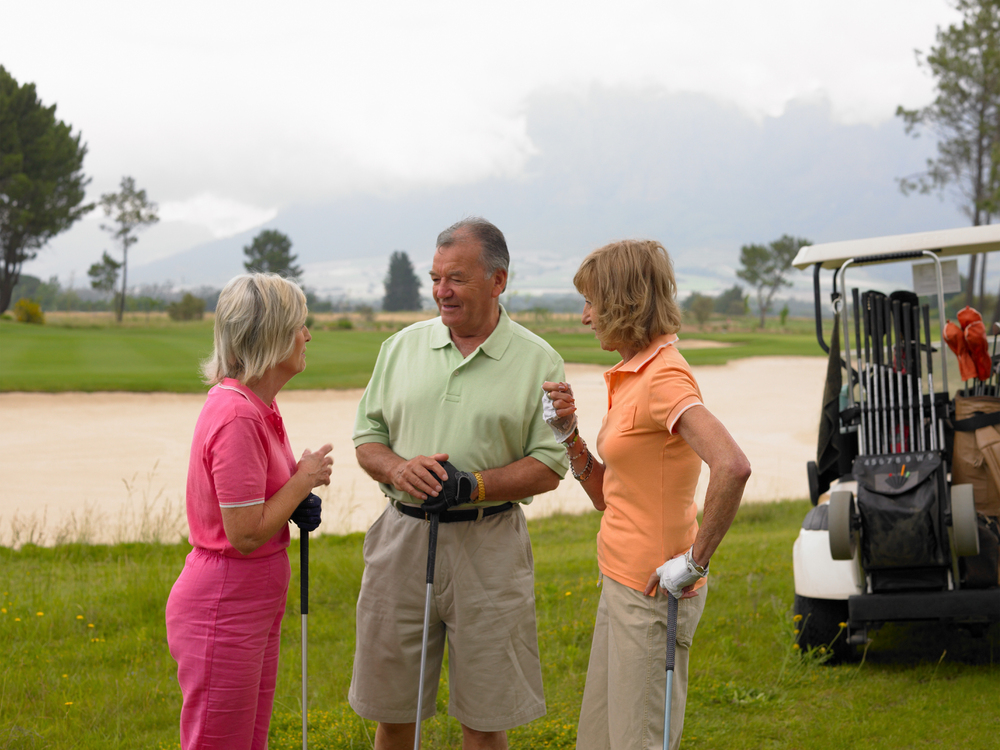 senior golfers playing golf in their free time