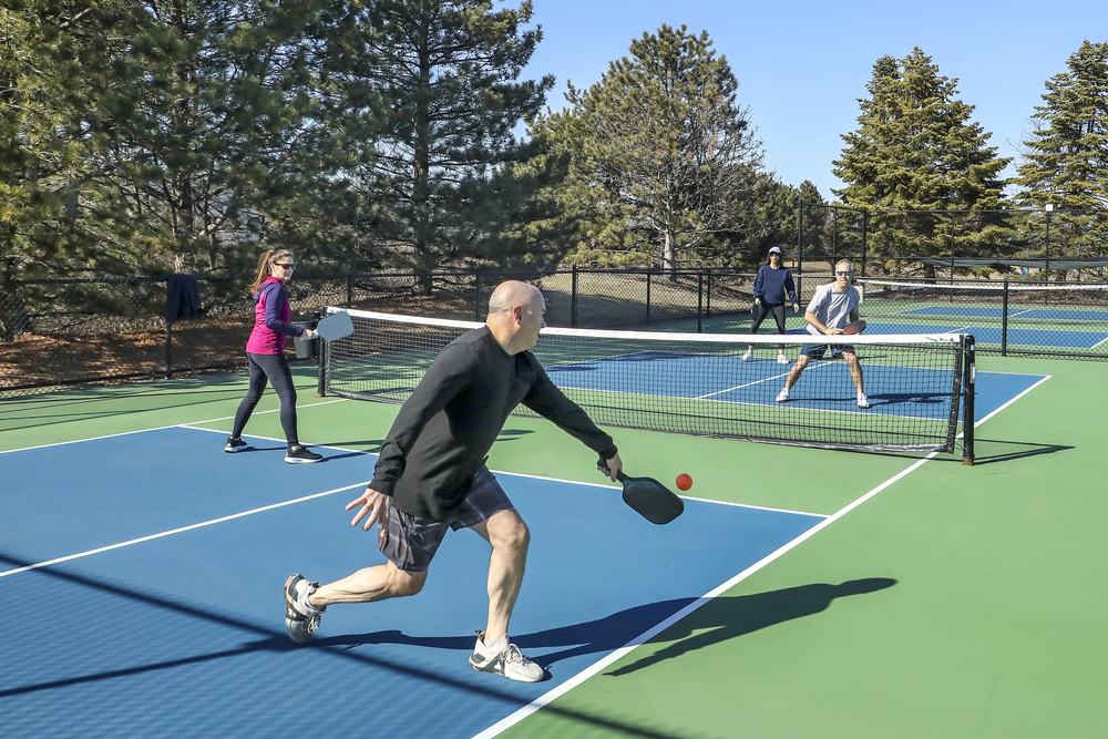seniors playing Pickleball