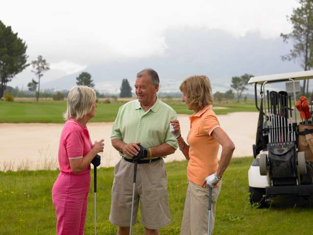 senior golfers playing golf in their free time
