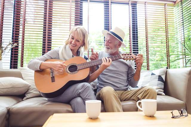 retiree playing guitar